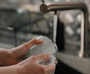 Person Holding Clear Plastic Container